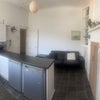 Photo 7: Kitchen and communal space