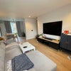 Photo 4: Living Room - shared area - 65 inch TV with sono sound system