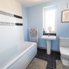 Photo 4: Bathroom with bath and shower
