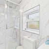 Photo 12: Shared Shower + Toilet 