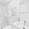 Photo 13: Shared Shower + Toilet