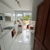 Photo 3: New kitchen with tall, integrated fridge, microwave and bins