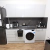 Photo 2: Food Prep & Laundry Area