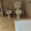 Photo 6: Toilet and bidet in large upstairs bathroom