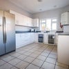 Photo 6: A fantastic Kitchen with all white goods to hand.
