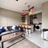 Photo 1: Great comply sitting area with a large smart TV 