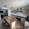 Photo 6: Bar seating & storage