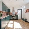 Photo 6: COMMUNAL KITCHEN