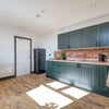 Photo 8: COMMUNAL KITCHEN