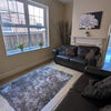 Photo 3: Shared Lounge with leather sofas