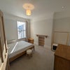 Photo 2: Example bedroom (currently available room is the same format but on the ground floor)