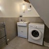 Photo 4: Shared Bathroom with Washing Machine