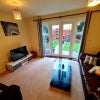 Photo 5: GF -  Communal Lounge area