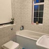 Photo 6: Bathroom with Shower over Bath