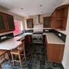 Photo 1: Kitchen with breakfast bar