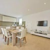 Photo 5: Modern, open-plan kitchen and dining area