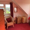 Photo 3: The room has distant sea views from both windows
