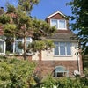 Photo 7: There are gardens at the front and back