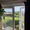 Photo 9: The room overlooks a 900 year-old church and the sea