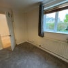 Photo 2: Bedroom off main living space with view to front garden