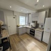 Photo 2: Hi Spec Kitchen, Dishwasher, 2x Oven, Washer Dryer