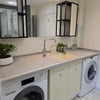 Photo 8: Utility with washing machine & tumble dryer.