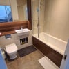 Photo 4: Large bathroom with bath tub