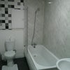 Photo 6: Bathroom.