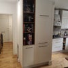 Photo 4: Living room door behind, looking down the hallway to the flat entrance