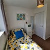 Photo 2: Comfy bed, built-in wardrobe, chest of drawers plus a desk