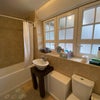 Photo 6: The bathroom shared between 2
