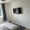 Photo 2: Wall mounted TV in Bedroom 