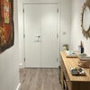 Photo 7: Entrance hall with large storage room
