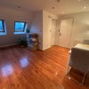 Photo 3: kitchen/living space -has a sofa there now
