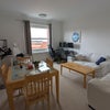 Photo 5: Lounge with our work from home setup