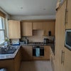 Photo 6: Kitchen with dishwasher, washing machine and full size fridge
