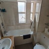 Photo 7: Shared bathroom with bath