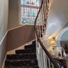 Photo 3: stairway to guest rooms