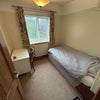Photo 8: Bed lifts for storage in room. Plenty other storage available. Hanger rail also avail if needed.