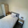 Photo 3: Downstairs bedroom with ensuite.