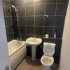 Photo 6: Upstairs toilet and bath