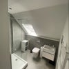 Photo 2: Modern bathroom double shower 