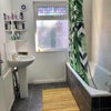 Photo 7: Large washroom with shower/tub and toilet (hidden in corner)
