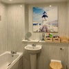 Photo 4: Shared bathroom with bath and shower