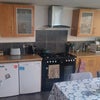 Photo 3: Kitchen and dining area
