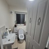 Photo 2: Private toilet and bathroom