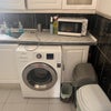 Photo 8: Washing machine and oven