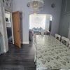 Photo 5: Middle room with dining table
