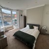 Photo 9: Double Bedroom 4