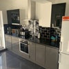 Photo 6: Kitchen cooking area